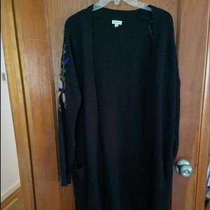 Black tunic cardigan with accent shoulders